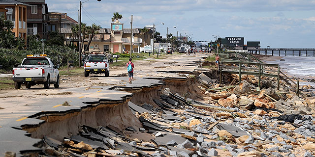 A road in Flagler Beach, Florida, washed out by ocean waters stirred up by Hurricane Matthew in October 2016. (Joe Raedle/Getty Images)