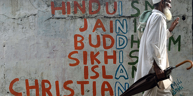 Graffiti on a Mumbai wall. (Indranil Mukherjee/AFP/Getty Images)