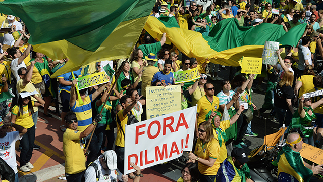 Demonstrators protest against Brazilian President Dilma Rousseff and the ruling Workers' Party (PT), at Paulista Avenue in Sao Paulo, Brazil, on Aug., 16, 2015. Photo Credit: Nelson Almeida/AFP/Getty Images